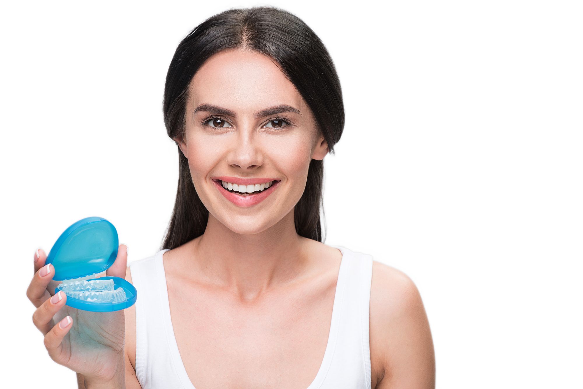 woman smiling with her clear aligners